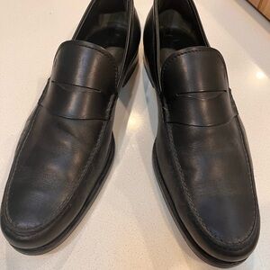 Tod's Elegant Black Leather Slip-Ons